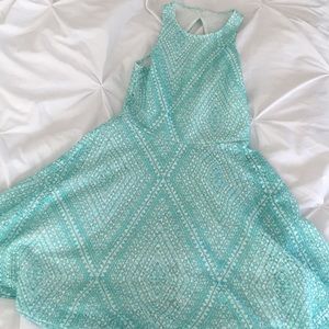 Turquoise blue dress with cut out in back